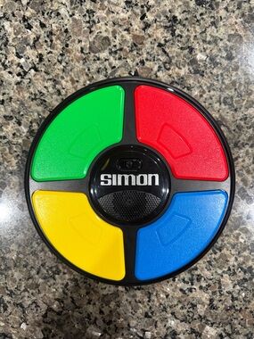 Simon Handheld Electronic Memory Game With Lights and Sounds